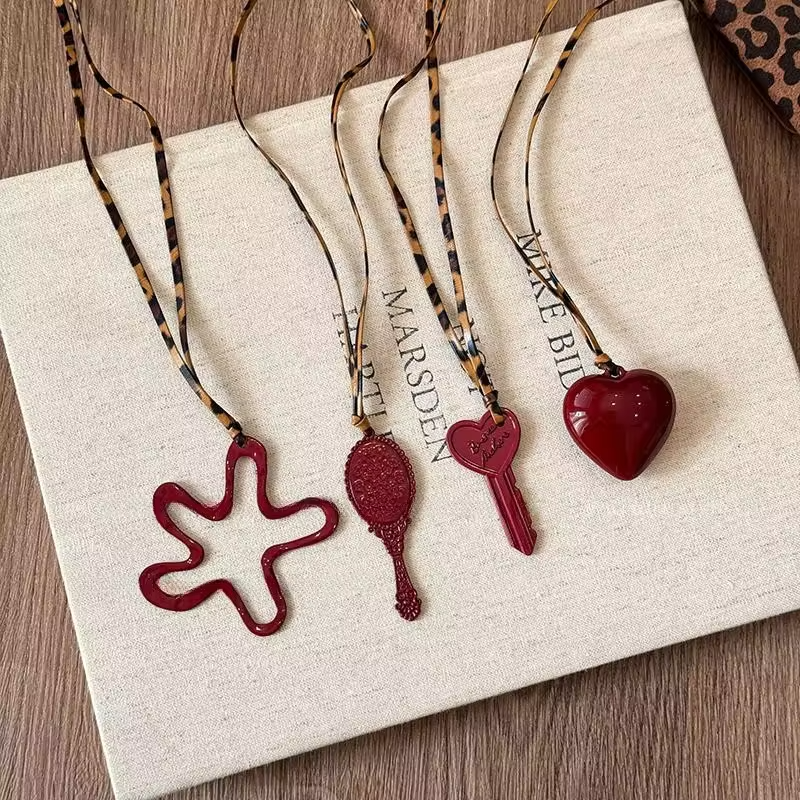 New Red Hollow Flower Necklace Heart Shaped Key Pendant Geometric Personality Leopard Leather Rope Necklace Women Sweater Chain